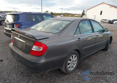2003 Toyota Camry Xle z USA, uszkodzony, nr VIN 4T1BE30K83U654640
